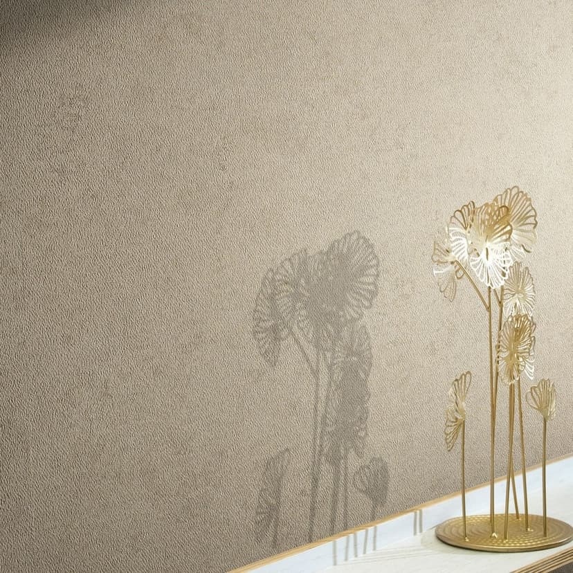 Non-woven tapet i modern gipslook med beige struktur