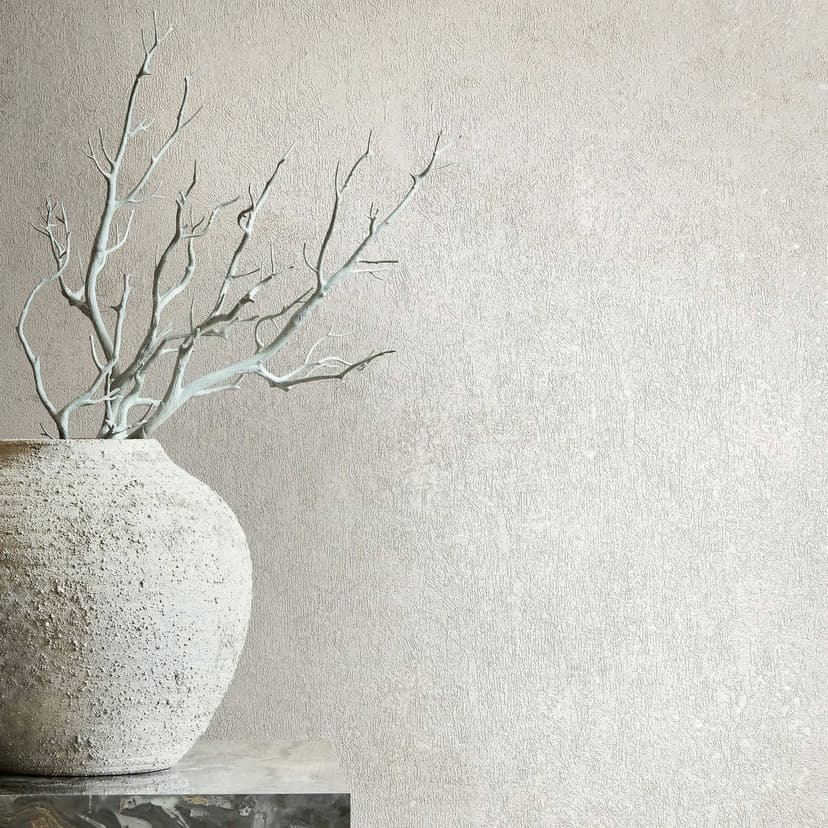 Non-woven tapet i en lätt glansig beige slät betonglook