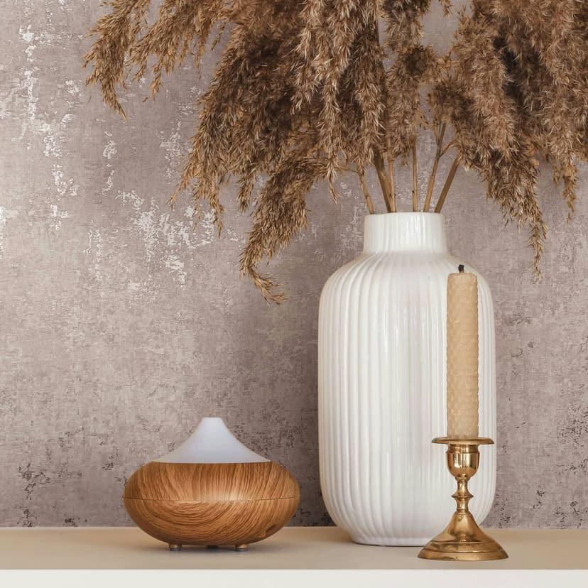 Non-woven tapet med skimrande glansig beige betonglook