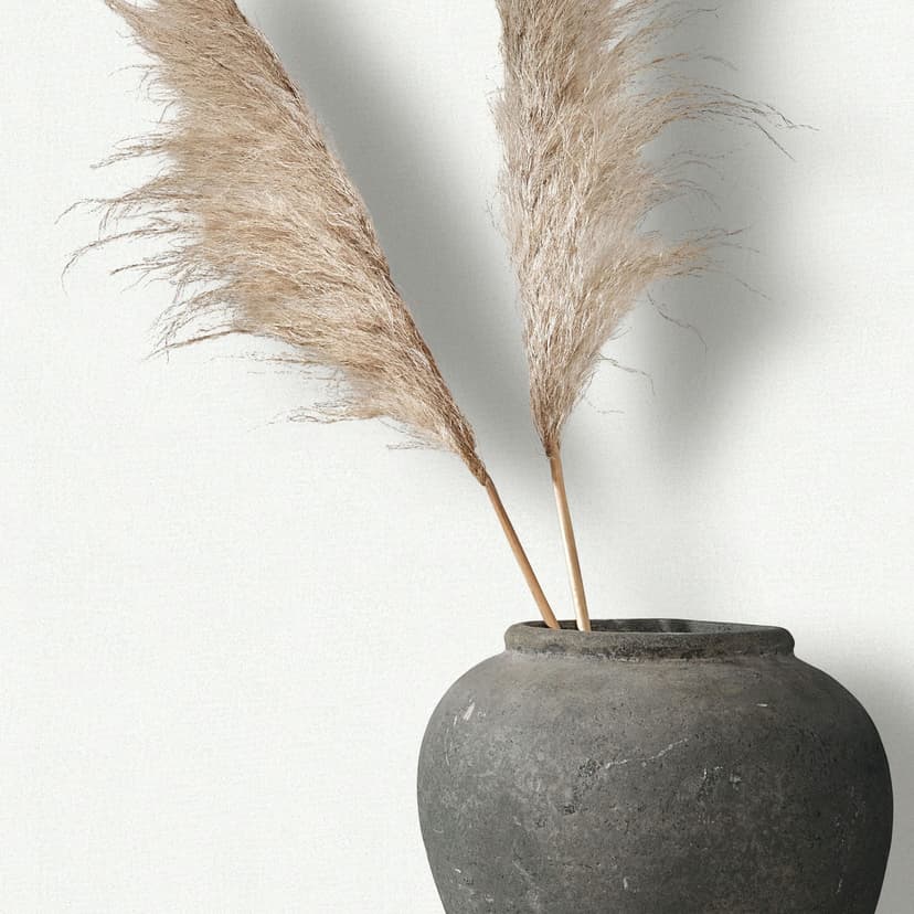 Non-woven tapet i vit texturerad textil med putsad look