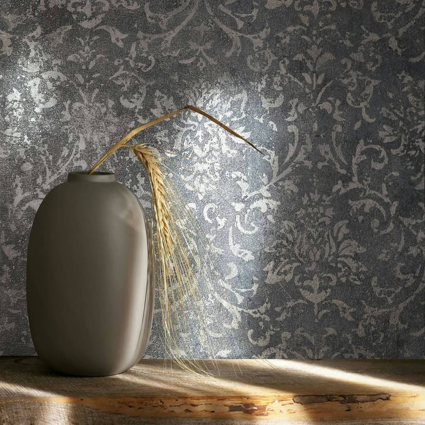 Non-woven tapet med ornamental betonglook svart ornament